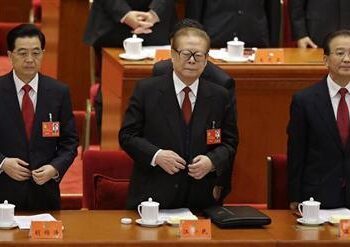 China’s ex-president overshadows party congress, transition